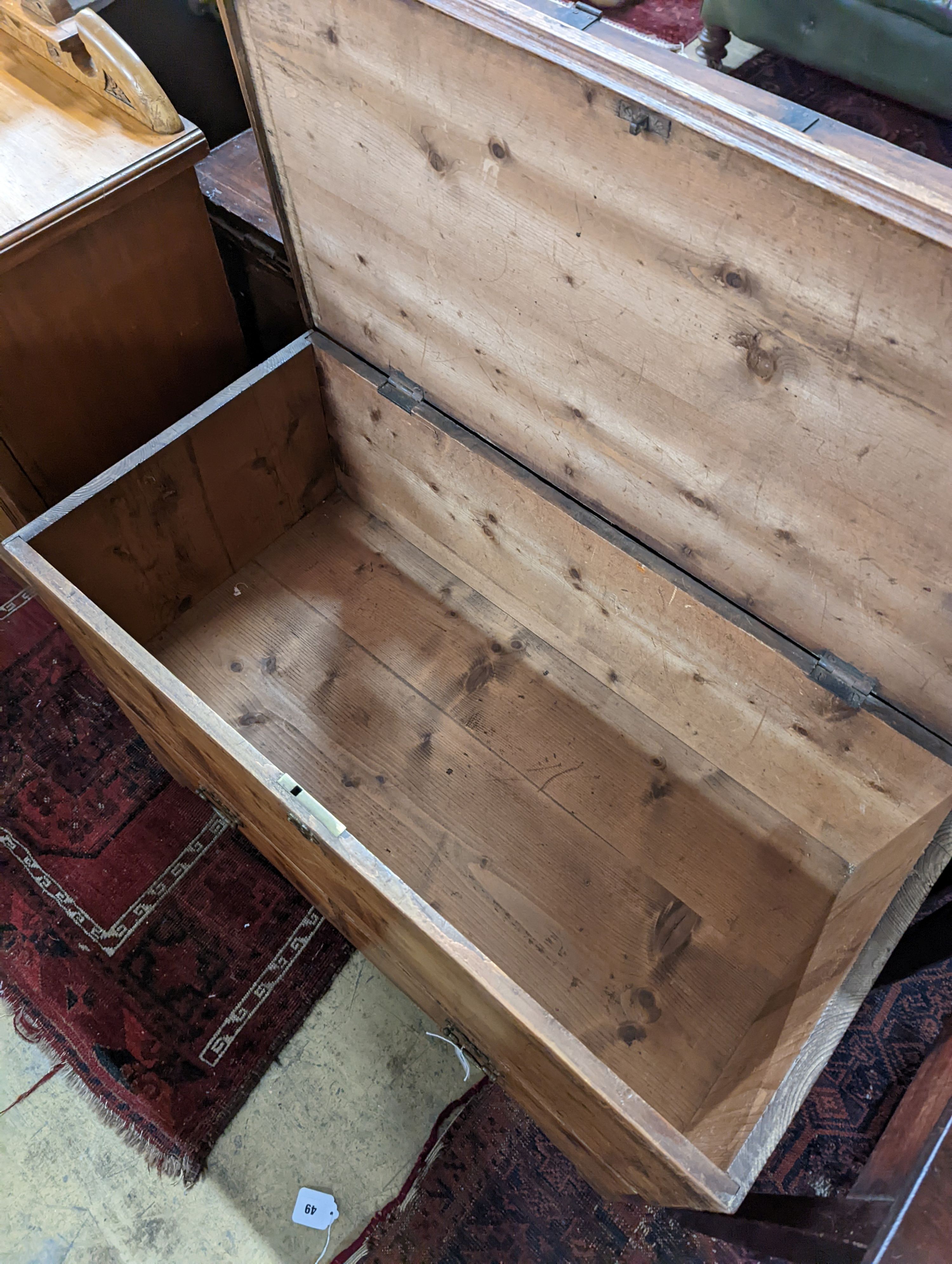 An early 19th century pine two drawer mule chest, length 90cm, depth 45cm, height 60cm
